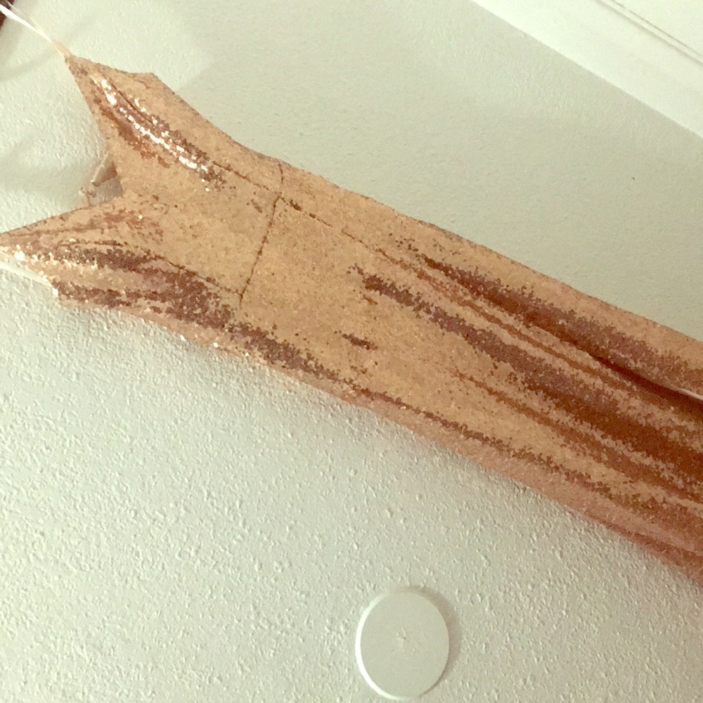 Rose gold snatch your body type of dress 😂
